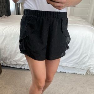 Black shorts with ruffles